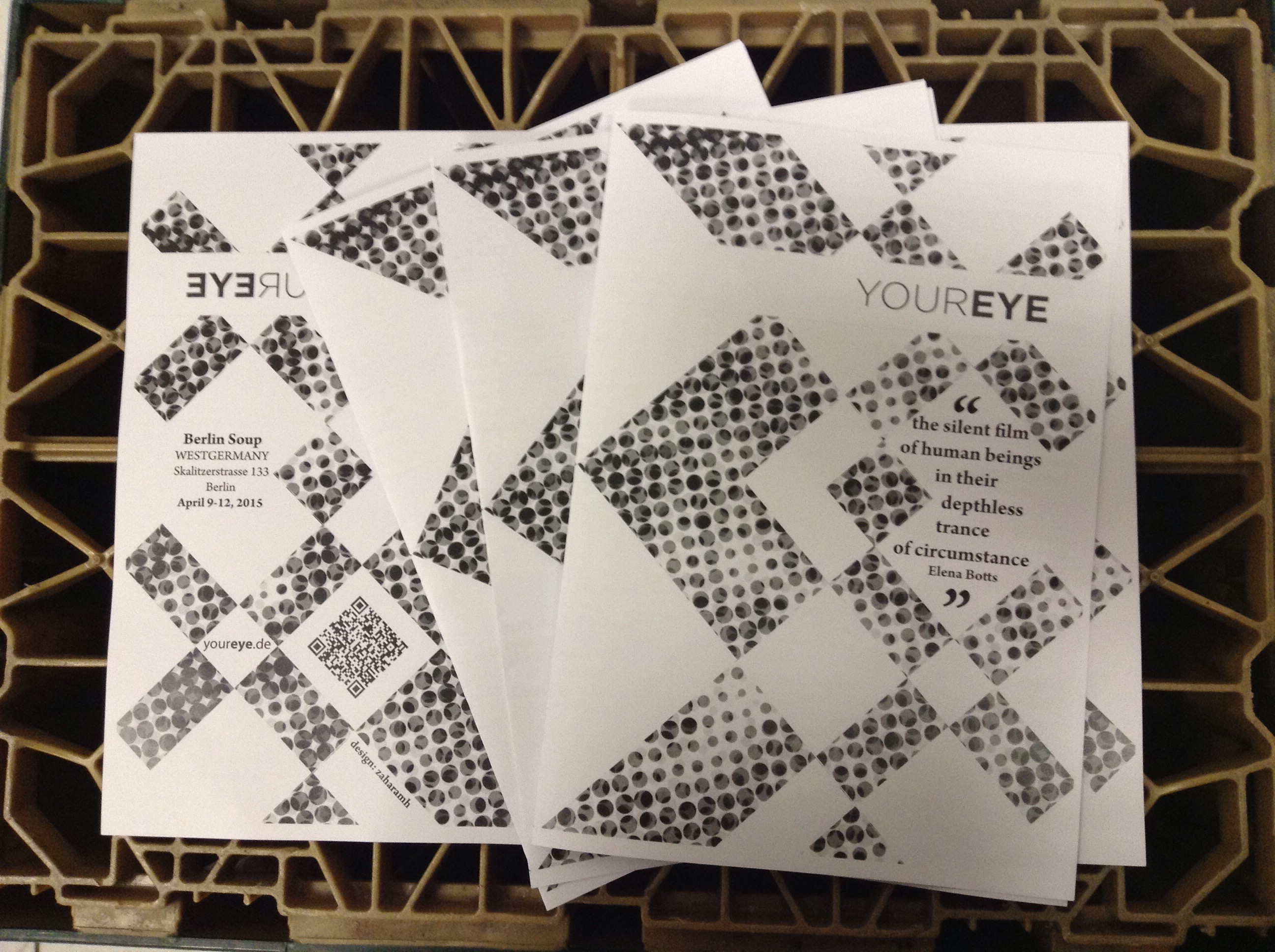 Picture of a flyer in black and white with a geometric design